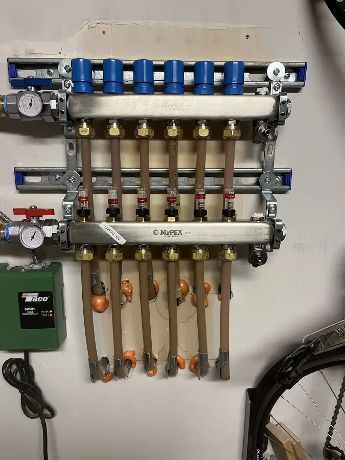 Plumber performing Water Heater Repair at a residential property in Lakeway